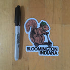 Bloomington squirrel on a bird sticker - badkneesTs | badkneesTs